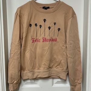 NEVER WORN small tan feliz navidad sweatshirt